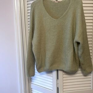 A pistachio colored sz s oversized womens sweater